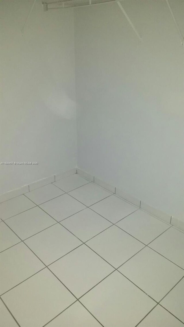 9810 Hammocks Blvd Unit 202, Miami, FL 33196 - spacious closet featuring tile patterned floors