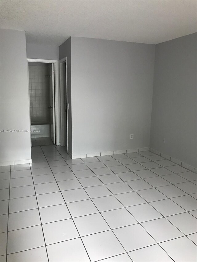 9810 Hammocks Blvd Unit 202, Miami, FL 33196 - unfurnished room featuring light tile patterned floors