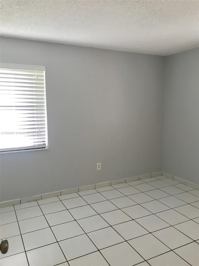 9810 Hammocks Blvd Unit 202, Miami, FL 33196 - empty room with a textured ceiling