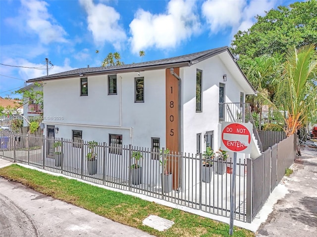 1805 SW 4th St, Miami, FL 33135 - view of front of property with a fenced front yard and stucco siding