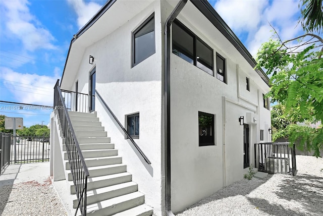 1805 SW 4th St, Miami, FL 33135 - view of property exterior with stairway and stucco siding