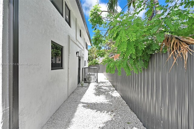 1805 SW 4th St, Miami, FL 33135 - view of property exterior featuring a fenced backyard and stucco siding