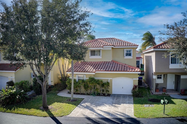 1762 E Trafalgar Cir, Hollywood, FL 33020 - mediterranean / spanish house featuring stucco siding, a garage, a tile roof, a front lawn, and concrete driveway