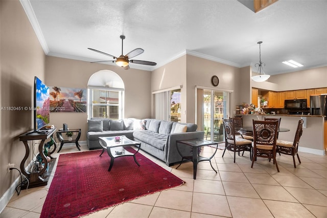 1762 E Trafalgar Cir, Hollywood, FL 33020 - living room featuring light tile patterned floors, crown molding, ceiling fan, and a textured ceiling