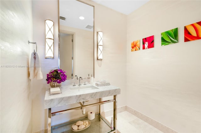 9705 Collins Ave Unit 1101N, Bal Harbour, FL 33154 - bathroom with vanity and baseboards