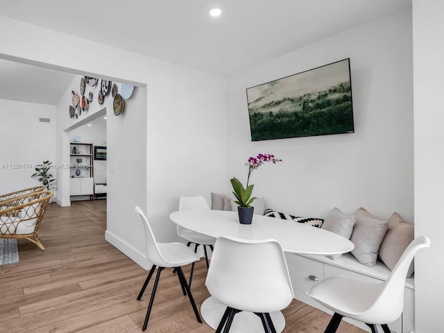 1130 NE 91st Ter, Miami Shores, FL 33138 - dining space featuring light wood-style floors and recessed lighting