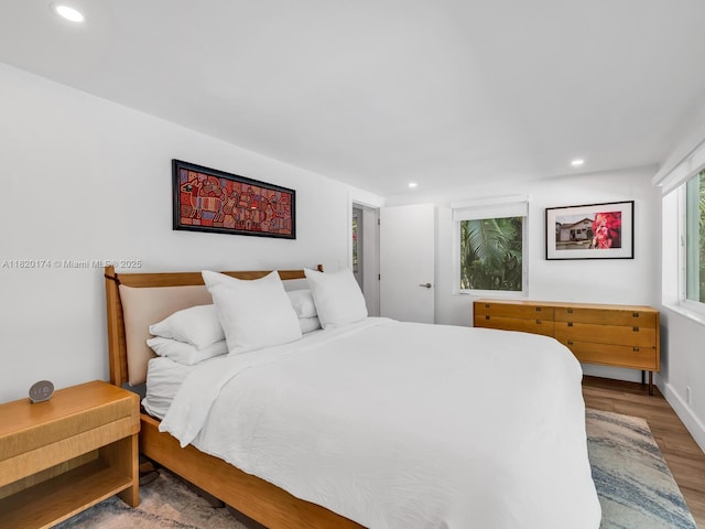 1130 NE 91st Ter, Miami Shores, FL 33138 - bedroom with wood finished floors and recessed lighting