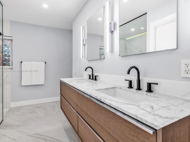 1130 NE 91st Ter, Miami Shores, FL 33138 - full bath with double vanity, recessed lighting, marble finish floors, and a marble finish shower