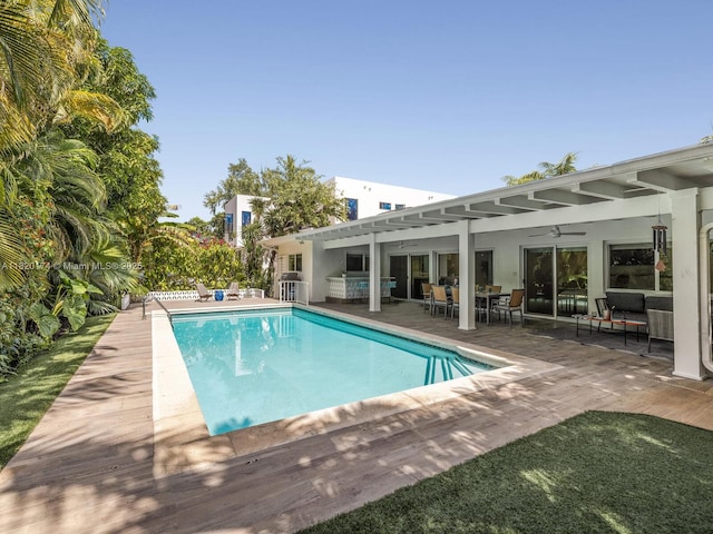 1130 NE 91st Ter, Miami Shores, FL 33138 - outdoor pool with ceiling fan, a patio area, and an outdoor living space