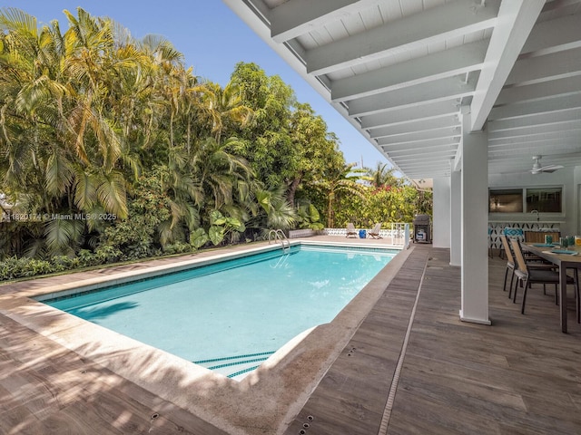 1130 NE 91st Ter, Miami Shores, FL 33138 - outdoor pool featuring a deck and outdoor dining area