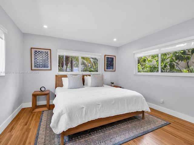 1130 NE 91st Ter, Miami Shores, FL 33138 - bedroom with light wood-style flooring and recessed lighting