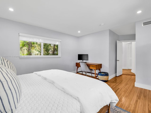 1130 NE 91st Ter, Miami Shores, FL 33138 - bedroom with wood finished floors and recessed lighting