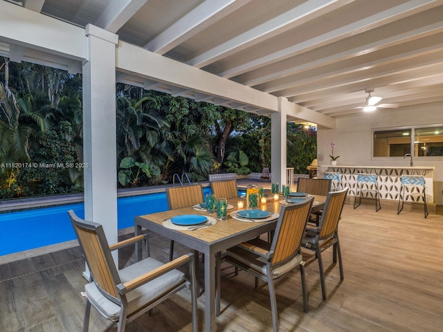 1130 NE 91st Ter, Miami Shores, FL 33138 - view of patio featuring outdoor dining area, an outdoor pool, ceiling fan, and a wooden deck