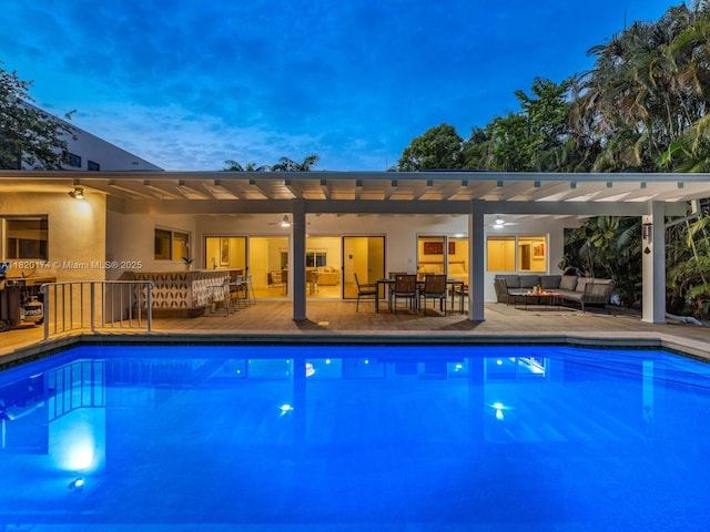 1130 NE 91st Ter, Miami Shores, FL 33138 - outdoor pool with an outdoor living space, ceiling fan, outdoor dining space, and a patio