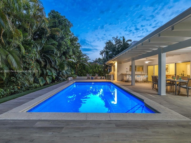1130 NE 91st Ter, Miami Shores, FL 33138 - swimming pool featuring a ceiling fan, outdoor dining space, and a patio