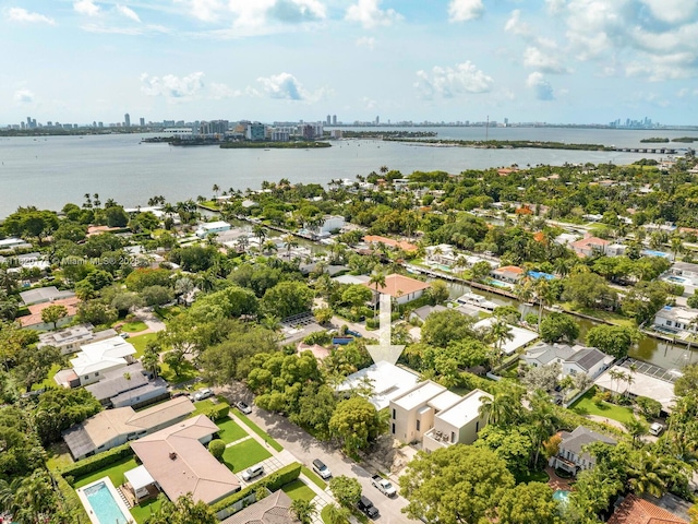 1130 NE 91st Ter, Miami Shores, FL 33138 - aerial perspective of suburban area featuring a nearby body of water, a notable bridge, and skyline