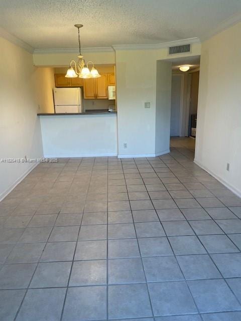 10007 Twin Lks Unit 25, Coral Springs, FL 33071 - unfurnished living room with a chandelier, a textured ceiling, crown molding, and tile patterned flooring