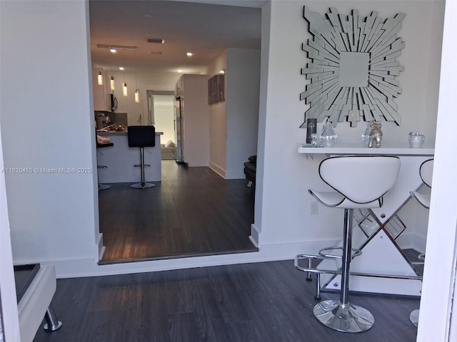636 E 18th St, Hialeah, FL 33013 - dining space featuring wood finished floors