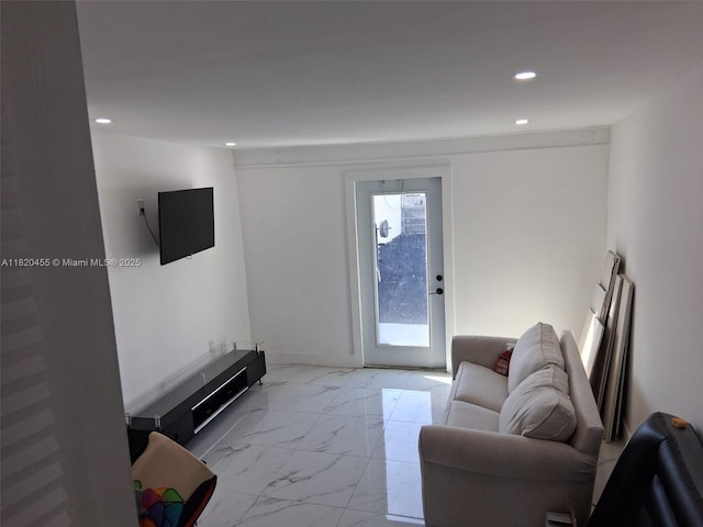 636 E 18th St, Hialeah, FL 33013 - living area with light marble finish flooring and recessed lighting