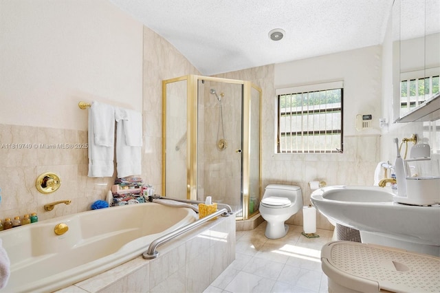 96 Bal Cross Dr, Bal Harbour, FL 33154 - bathroom featuring tile walls, a bidet, a garden tub, a stall shower, and a textured ceiling