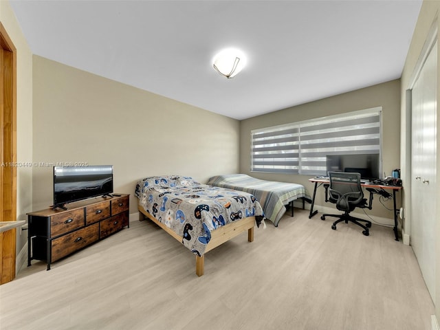 9933 NW 49th Ter, Doral, FL 33178 - bedroom with wood finished floors and a desk