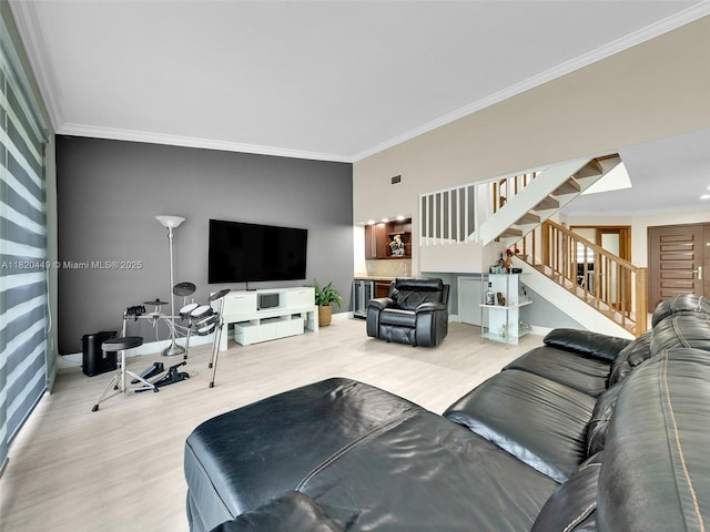 9933 NW 49th Ter, Doral, FL 33178 - living area with ornamental molding, wood finished floors, and stairway