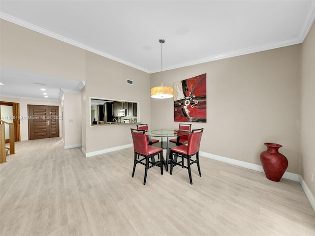 9933 NW 49th Ter, Doral, FL 33178 - dining space featuring crown molding and wood finished floors