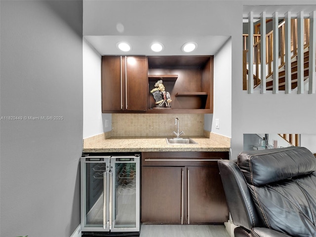 9933 NW 49th Ter, Doral, FL 33178 - indoor wet bar with wine cooler, tasteful backsplash, and recessed lighting