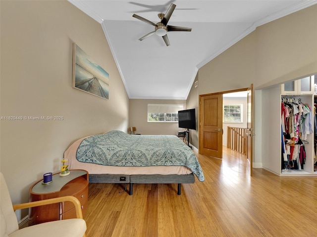 9933 NW 49th Ter, Doral, FL 33178 - bedroom with crown molding, wood finished floors, vaulted ceiling, and ceiling fan