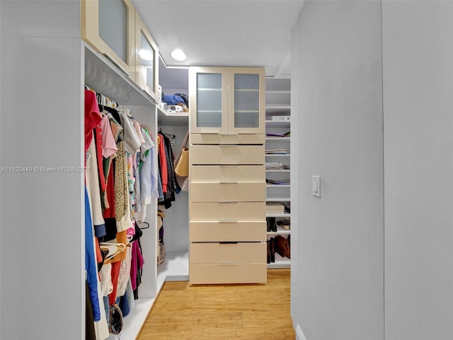 9933 NW 49th Ter, Doral, FL 33178 - walk in closet with wood finished floors