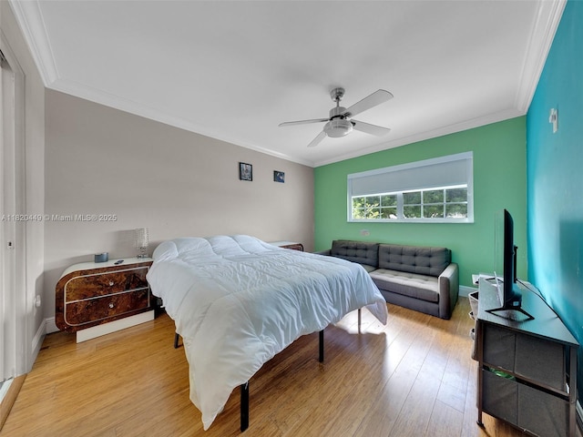 9933 NW 49th Ter, Doral, FL 33178 - bedroom with crown molding, light wood-type flooring, and ceiling fan