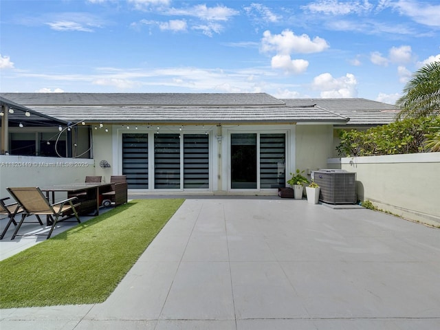 9933 NW 49th Ter, Doral, FL 33178 - rear view of property featuring a patio area and stucco siding