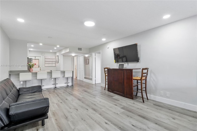 215 SE 3rd Ave Unit 303B, Hallandale Beach, FL 33009 - living room featuring light wood-type flooring and recessed lighting
