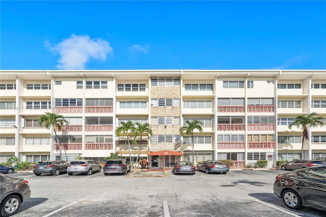 215 SE 3rd Ave Unit 303B, Hallandale Beach, FL 33009 - view of apartment building / complex with uncovered parking