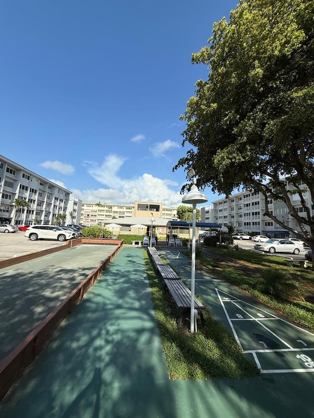 215 SE 3rd Ave Unit 303B, Hallandale Beach, FL 33009 - view of home's community featuring a bocce ball area and shuffleboard