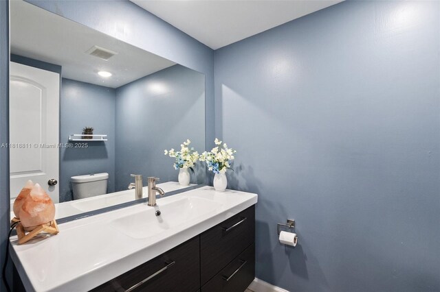 2781 Taft St Unit 308, Hollywood, FL 33020 - half bath with vanity and toilet