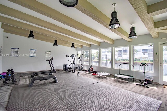 2781 Taft St Unit 308, Hollywood, FL 33020 - gym featuring carpet, beam ceiling, and plenty of natural light