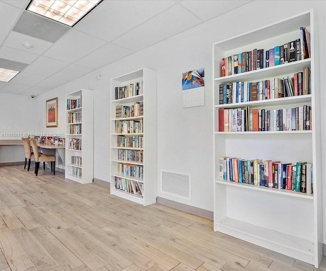 2781 Taft St Unit 308, Hollywood, FL 33020 - living area with wood finished floors, built in features, and an office area