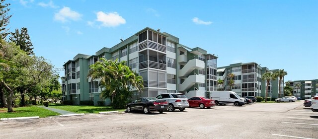 2781 Taft St Unit 308, Hollywood, FL 33020 - view of apartment building / complex with uncovered parking
