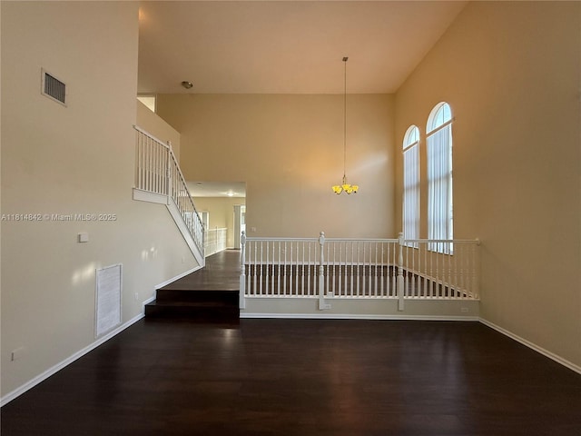 15875 SW 52nd St, Miramar, FL 33027 - entrance foyer featuring wood finished floors, a high ceiling, and stairs