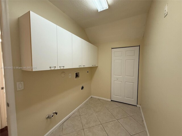 15875 SW 52nd St, Miramar, FL 33027 - laundry room with hookup for a gas dryer, electric dryer hookup, cabinet space, washer hookup, and light tile patterned flooring
