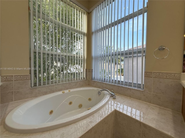 15875 SW 52nd St, Miramar, FL 33027 - full bathroom with a whirlpool tub and wainscoting