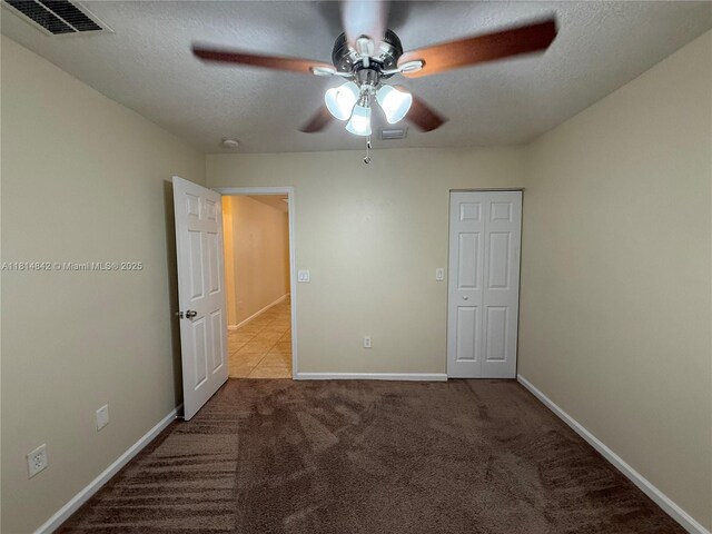 15875 SW 52nd St, Miramar, FL 33027 - unfurnished bedroom featuring a textured ceiling, carpet, and ceiling fan