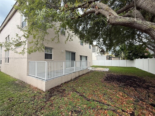 15875 SW 52nd St, Miramar, FL 33027 - back of property featuring stucco siding