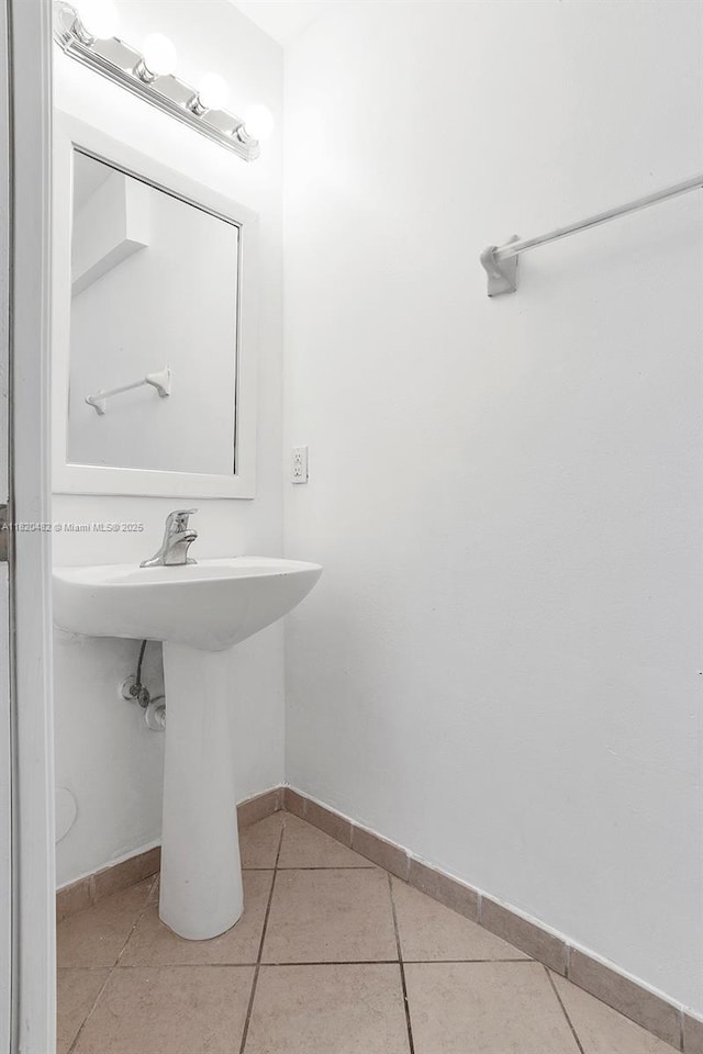 22569 SW 89th Pl, Cutler Bay, FL 33190 - bathroom with tile patterned flooring and baseboards