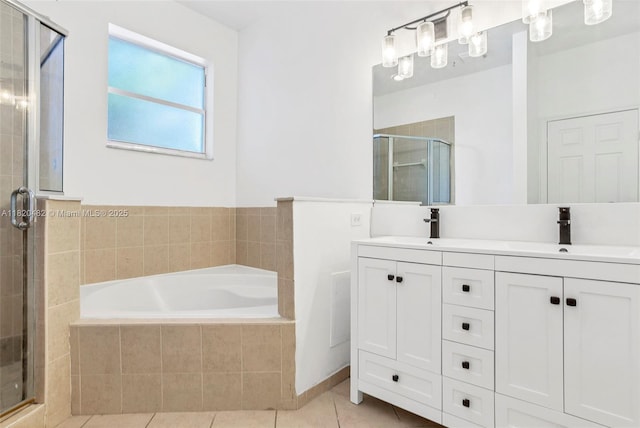 22569 SW 89th Pl, Cutler Bay, FL 33190 - full bathroom featuring a shower stall, a bath, and double vanity