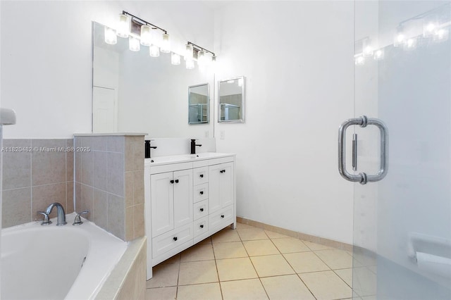 22569 SW 89th Pl, Cutler Bay, FL 33190 - full bathroom with double vanity, a bath, and tile patterned floors