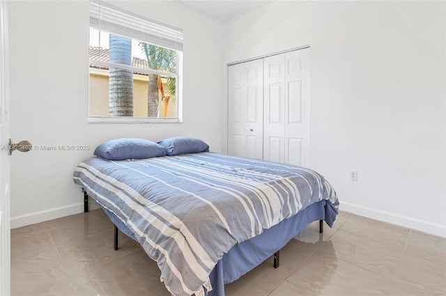 22569 SW 89th Pl, Cutler Bay, FL 33190 - bedroom featuring baseboards and a closet