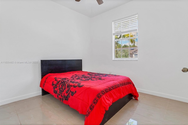 22569 SW 89th Pl, Cutler Bay, FL 33190 - tiled bedroom featuring baseboards and ceiling fan