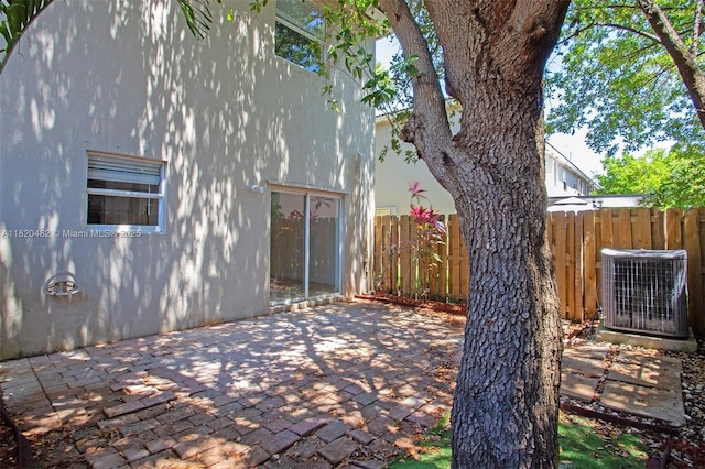 22569 SW 89th Pl, Cutler Bay, FL 33190 - rear view of property with a patio and stucco siding